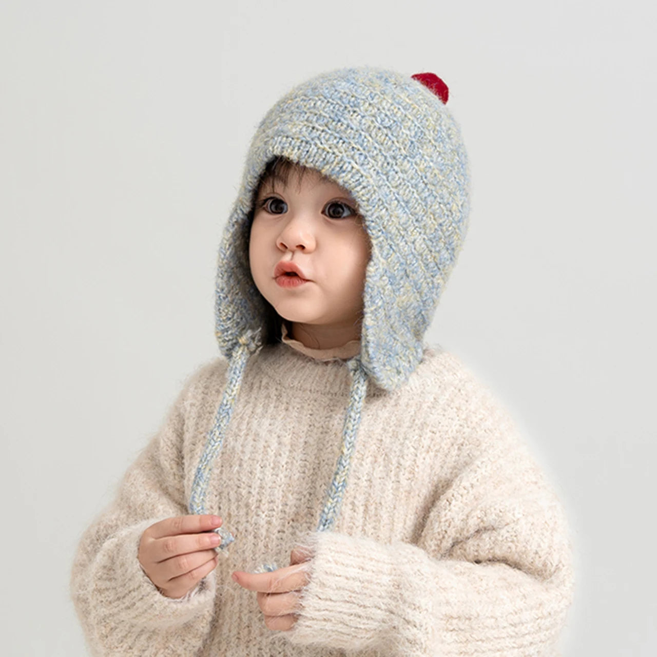 Bonnet Bébé à Pompon Cache-Oreilles