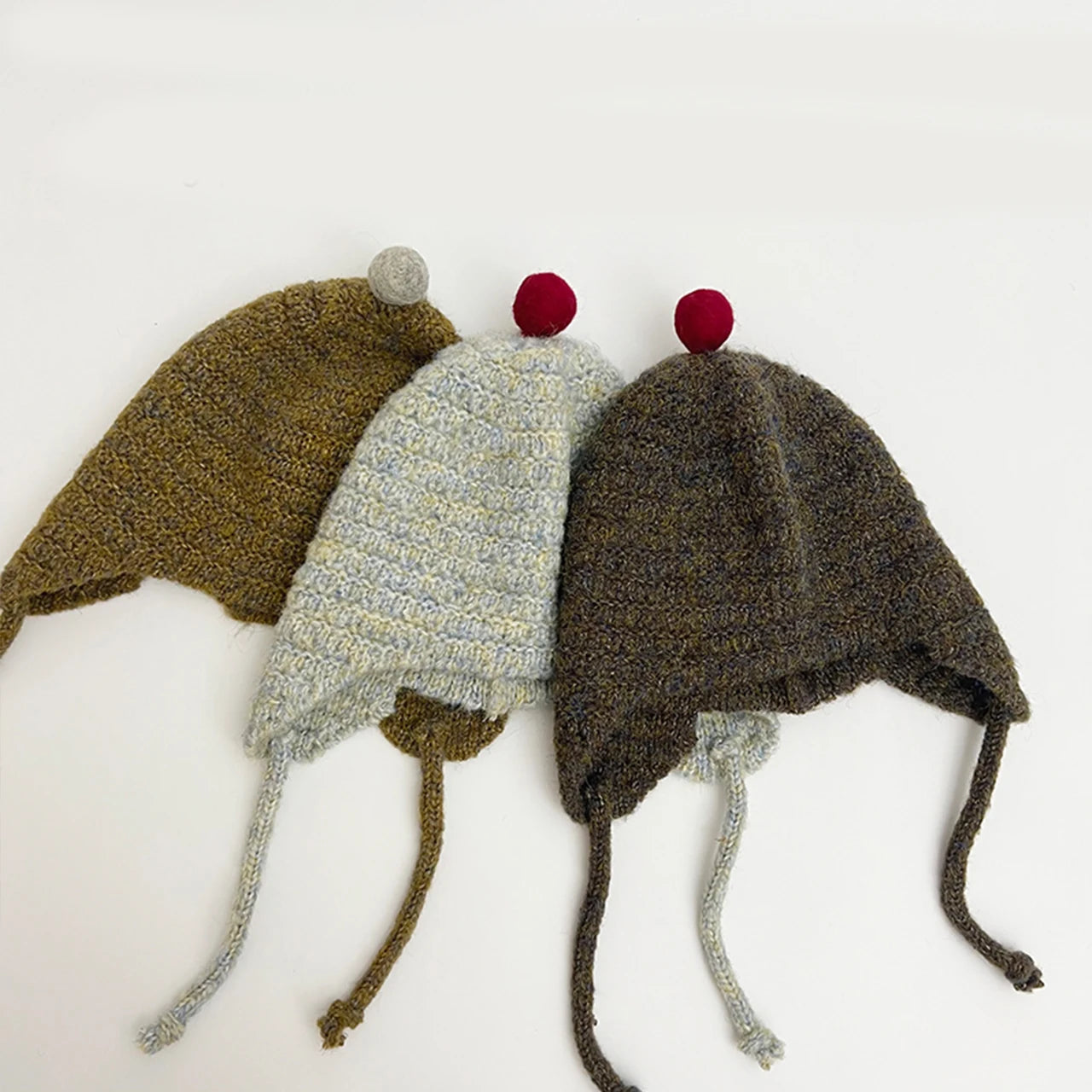 Bonnet Bébé à Pompon Cache-Oreilles