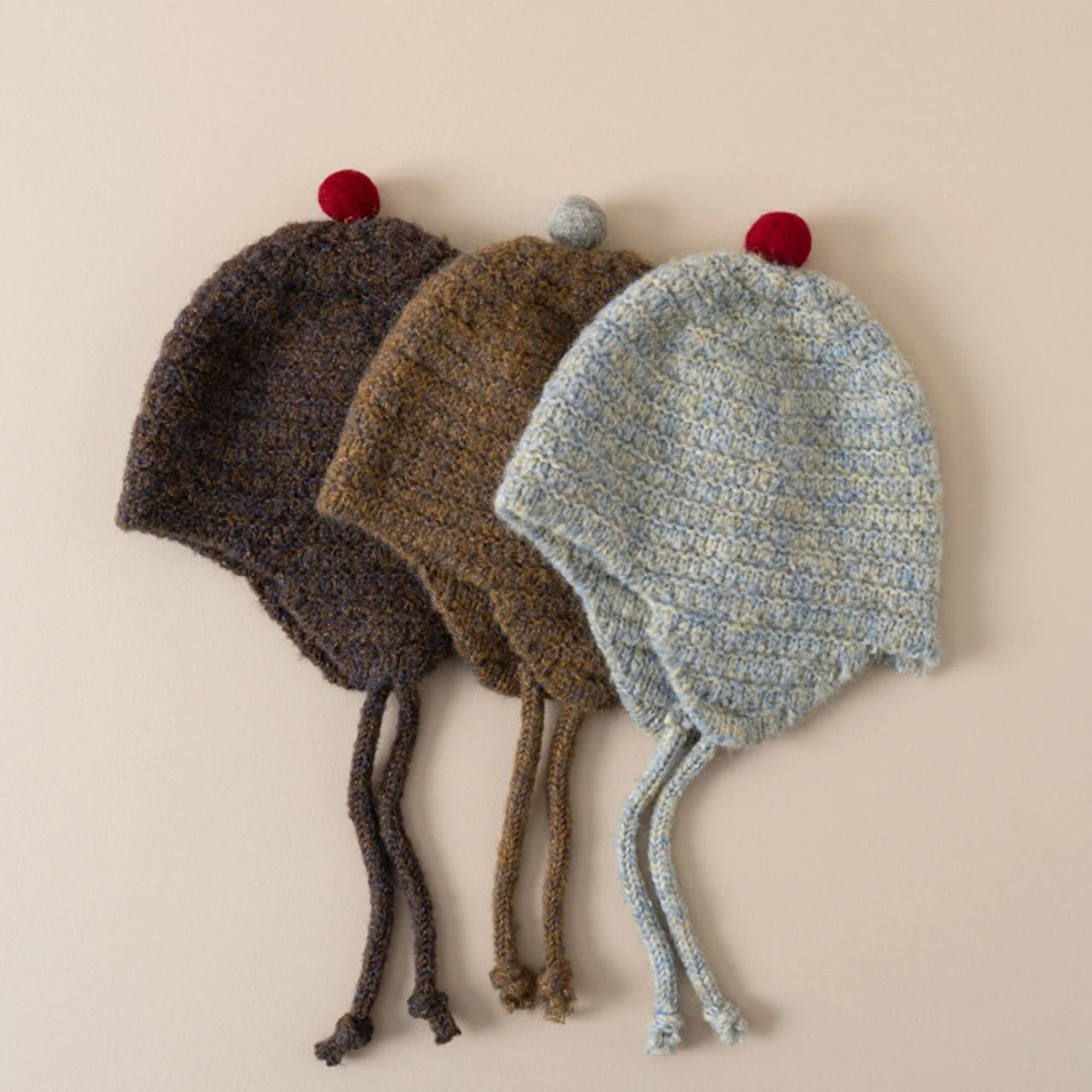 Bonnet Bébé à Pompon Cache-Oreilles