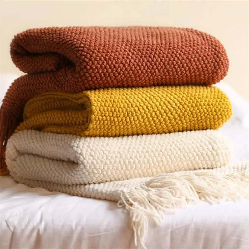 Plaid Tricoté Multi-Usage - Coloris Uni avec Pompons